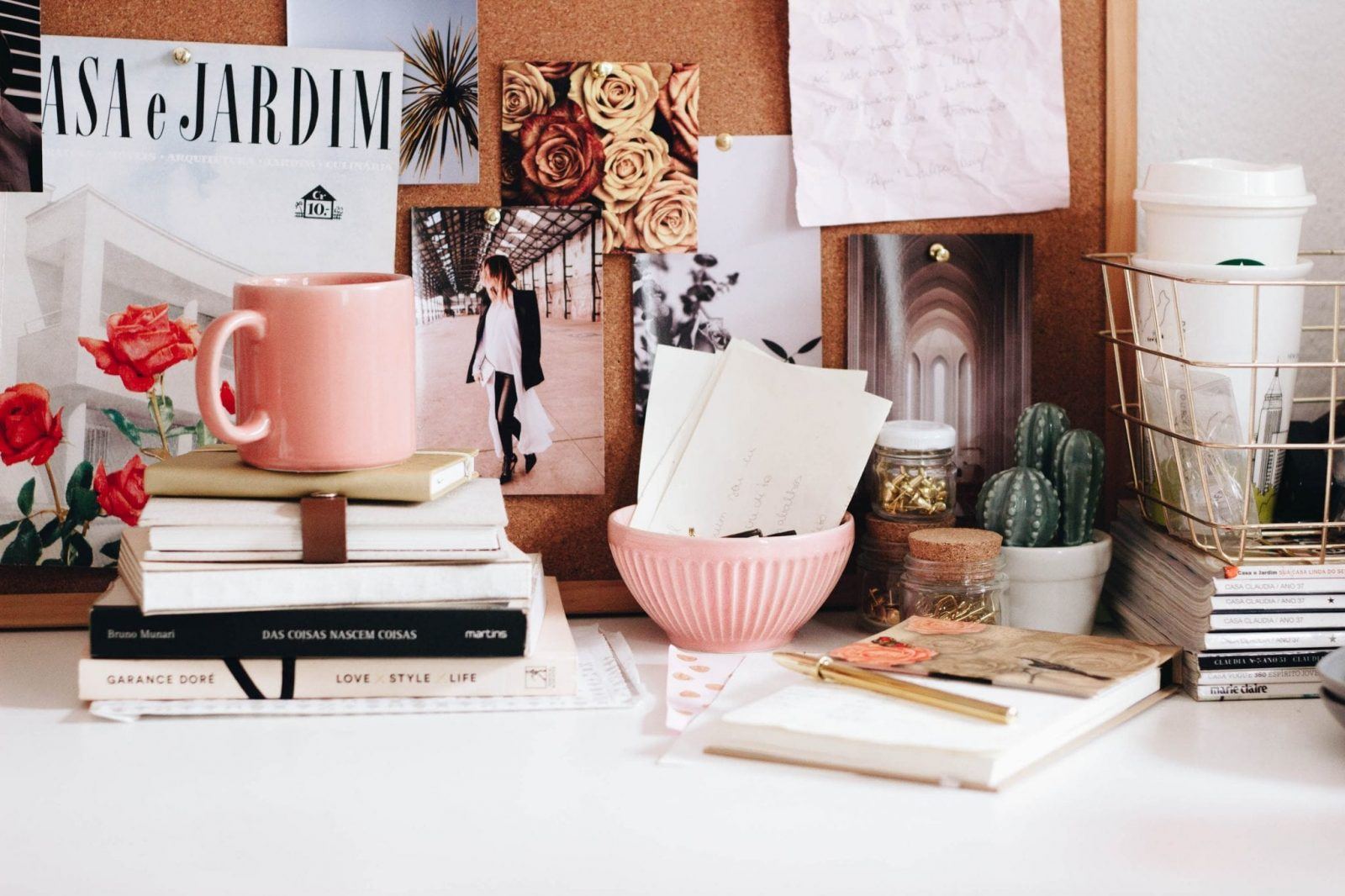 pretty desk set up with pinks and flowers advice for how to reduce stress