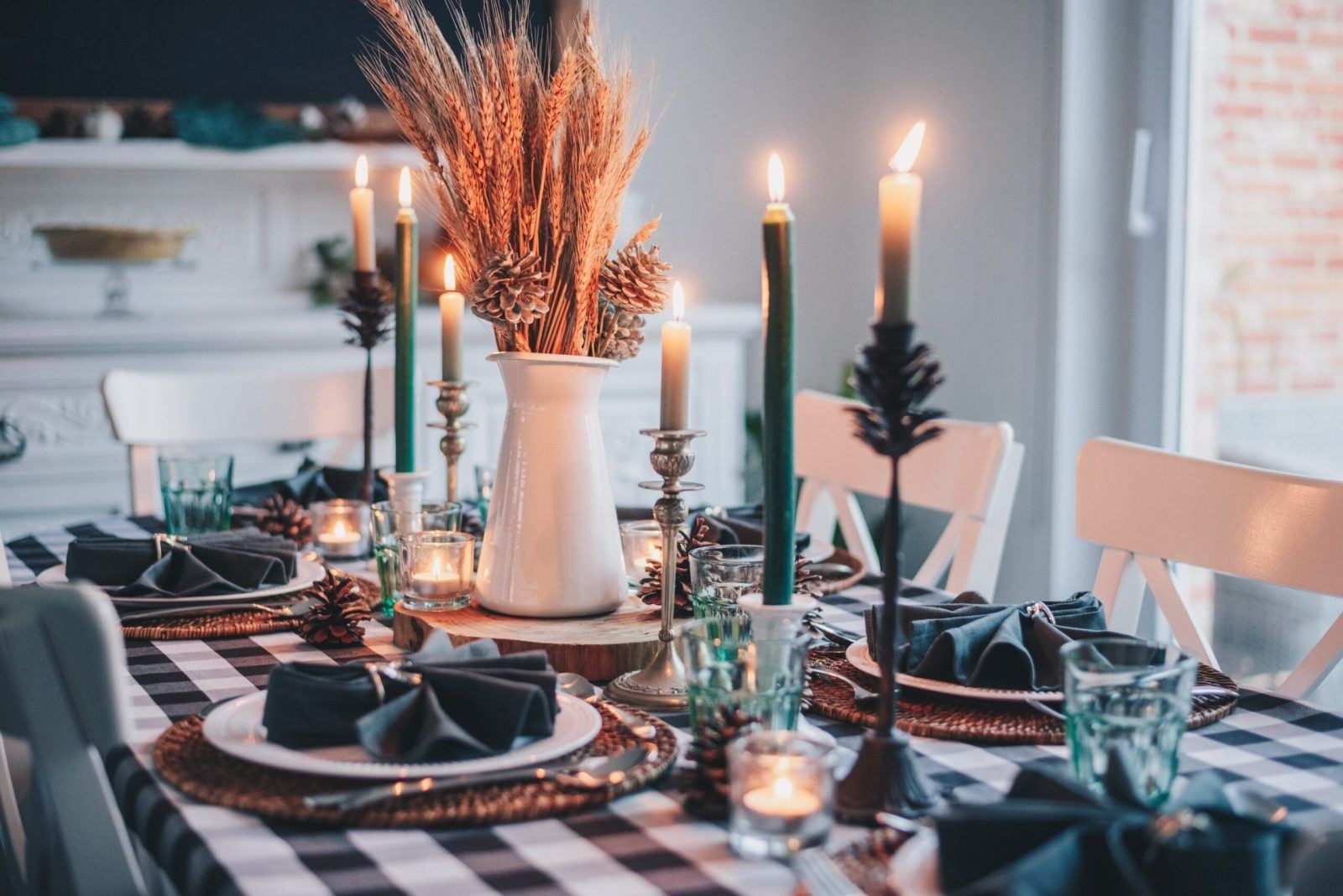pretty tablescape with candles and Christmas decorations budgeting for Christmas