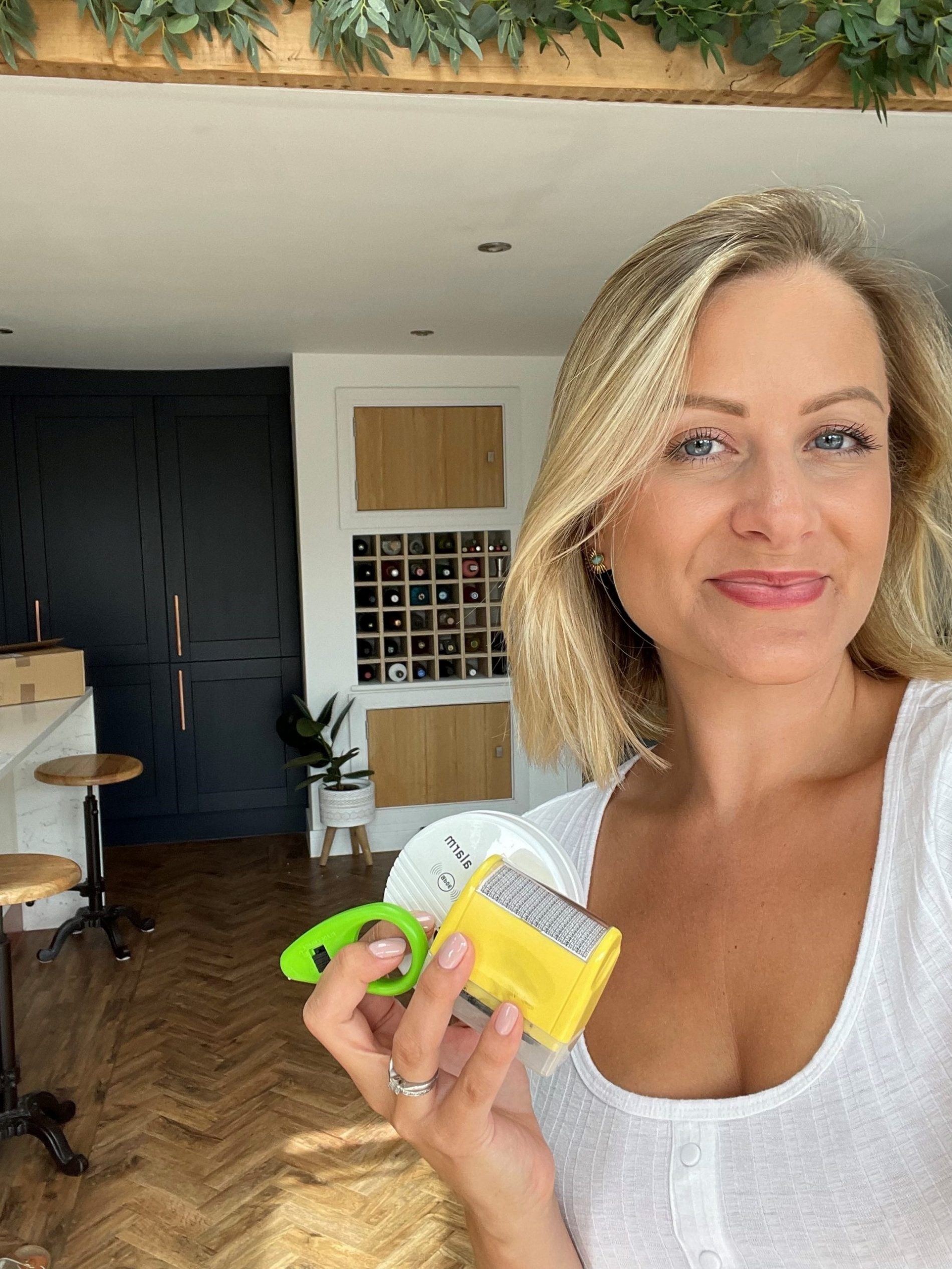 woman holding amazon gadgets